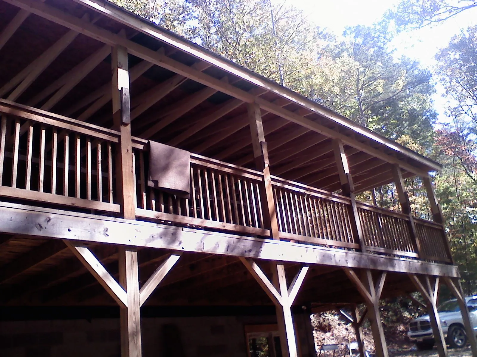 Timber framing under a new elevated porch and deck — Roof Leak Repair in Loveland by Roofing Brothers